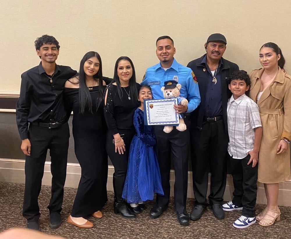 Marcela with her family