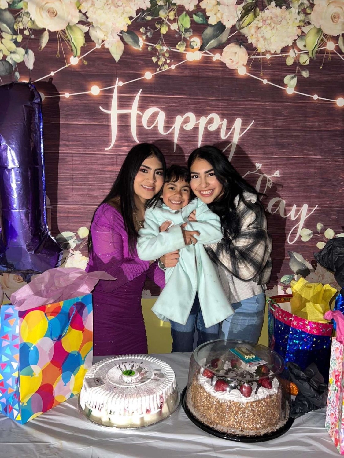 Marcela with her younger siblings